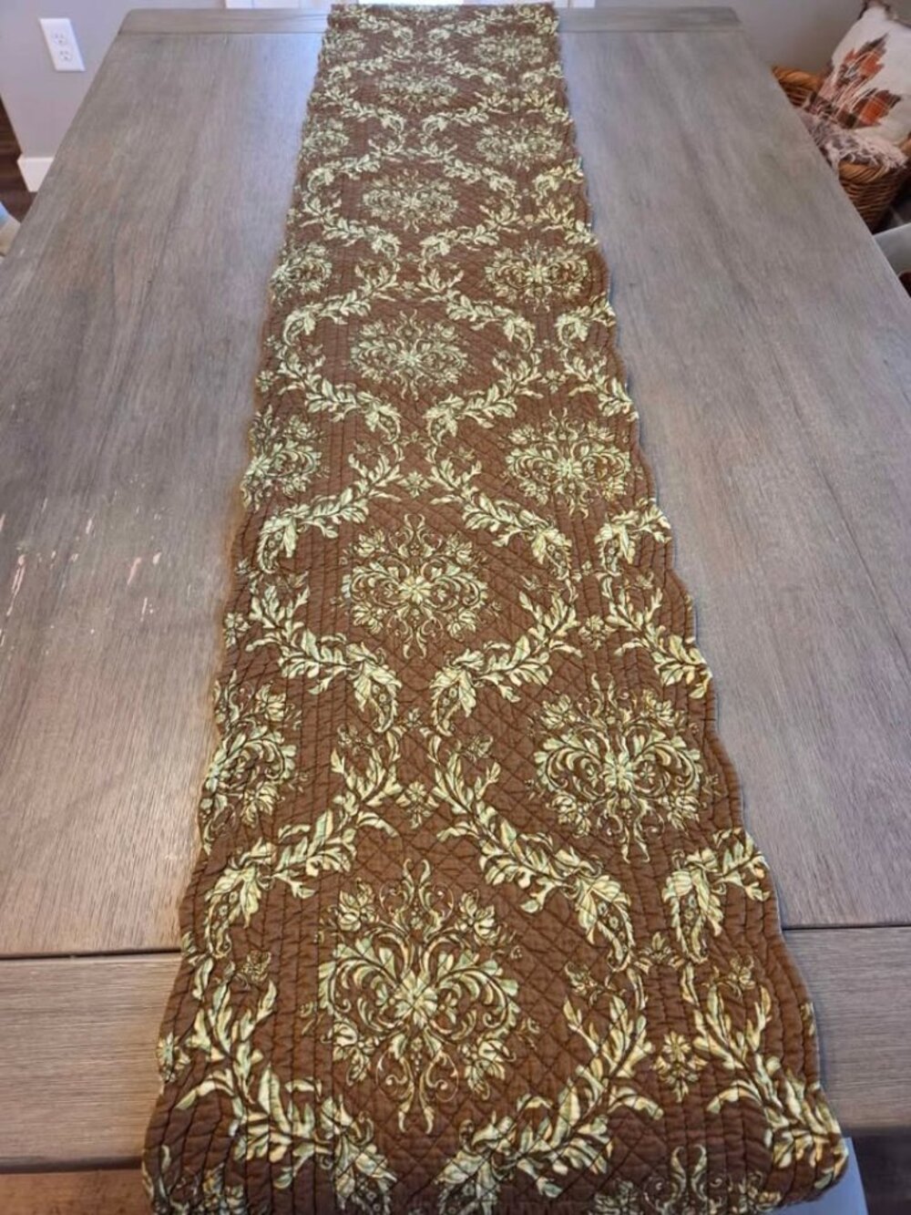 Brown and green quilted table runner